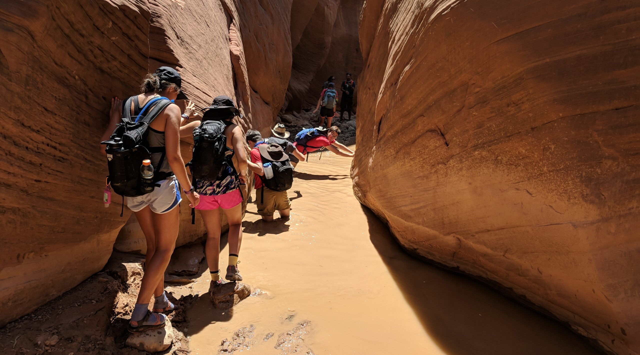 Students walk through the Colorado River Basin to illustrate the University Honors and Scholars Program geo journey trip.