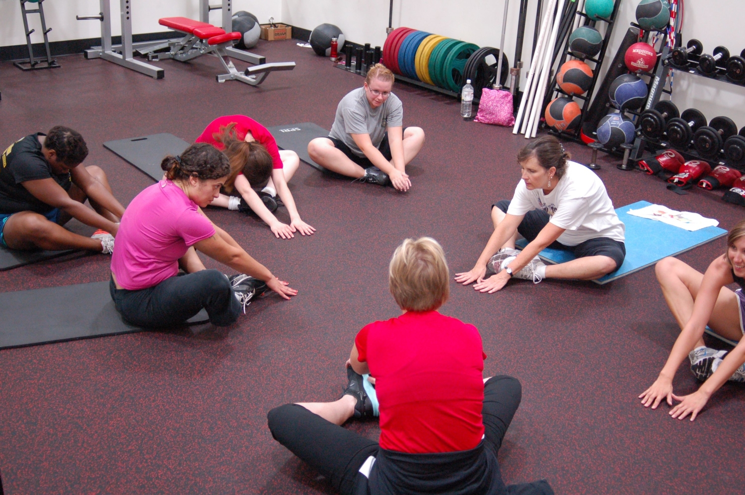 Students and faculty in a Group Strength yoga class