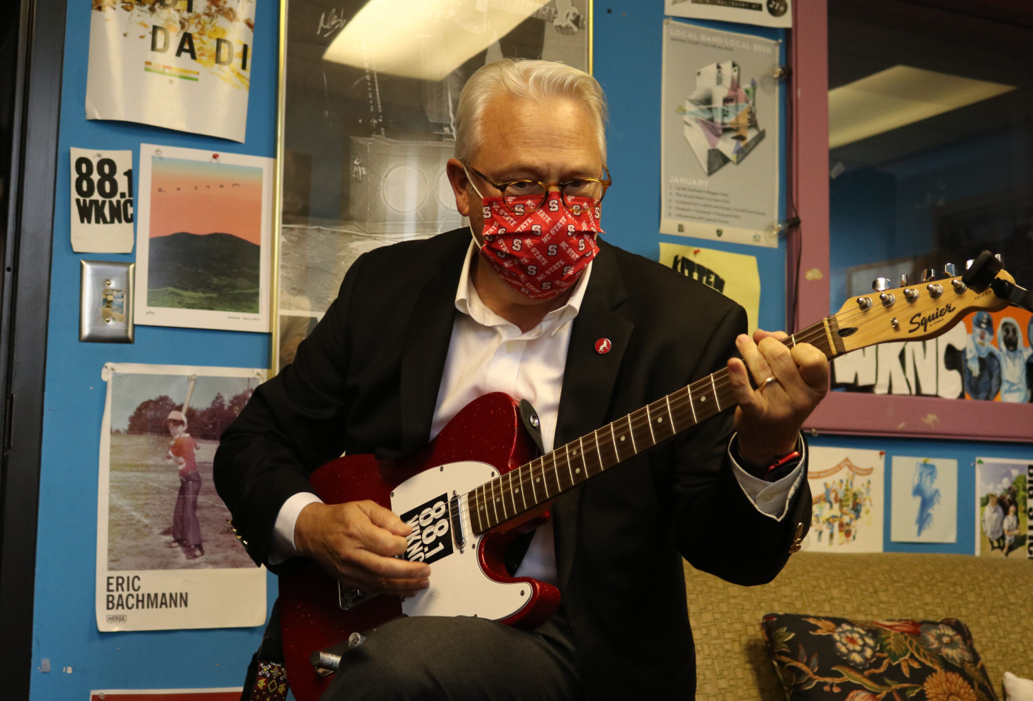 Chancellor Woodson playing guitar